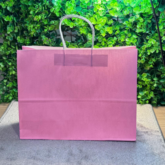 A collection of colorful A5-sized kraft paper bags with twisted handles, displayed on a gray background. Includes bags in white, pink, black, brown, and blue