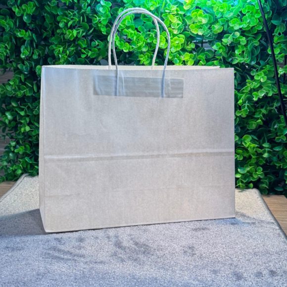 A collection of colorful A5-sized kraft paper bags with twisted handles, displayed on a gray background. Includes bags in white, pink, black, brown, and blue