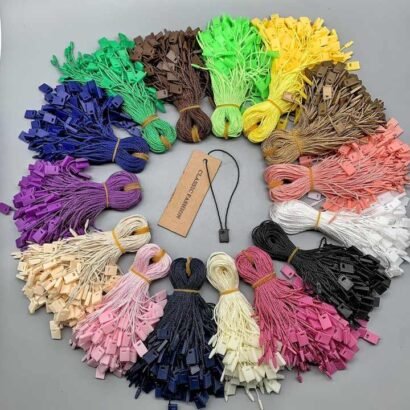 A colorful collection of tie ropes in various shades, ideal for securing hang tags and enhancing product presentation with a professional touch